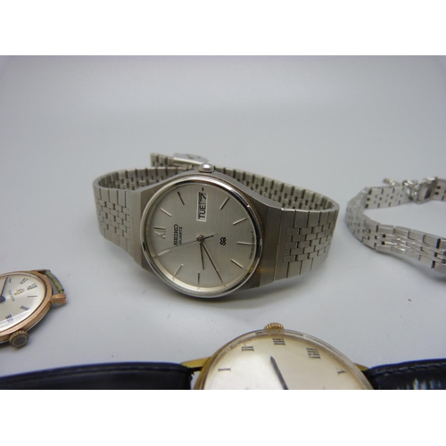 971 - Four wristwatches including two Seiko, chains and a brooch