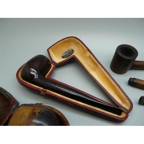 992 - A collection of pipes, a Bakelite cased razor and a Bakelite cased cigarette holder