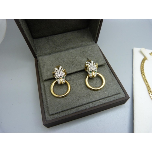 996 - A leopard necklace, earrings and brooch