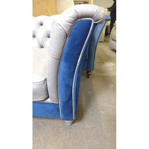 1471 - A grey leather and blue velvet buttoned three seater sofa