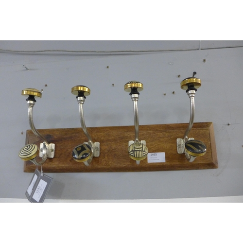 1489 - A rack of four coat hooks with ceramic knobs (HH563916)   #