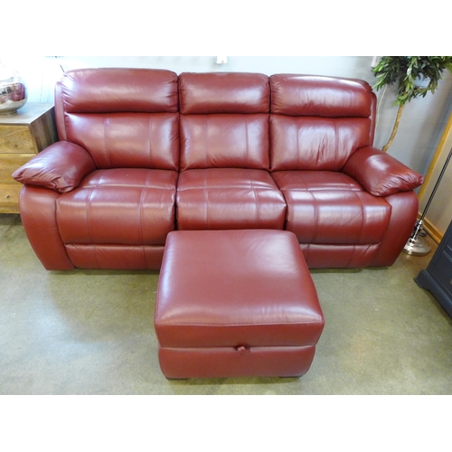 1348 - A red leather electric reclining sofa and footstool