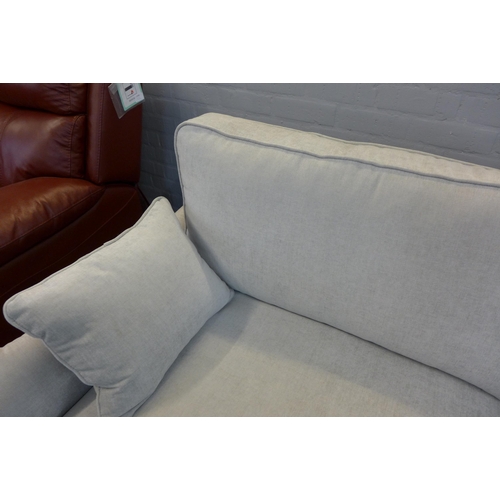 1350 - A Soho light grey fabric three seater sofa