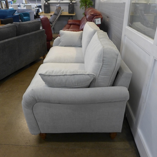 1350 - A Soho light grey fabric three seater sofa