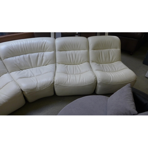 1639 - A cream leather sectional five piece sofa