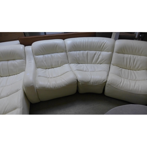 1639 - A cream leather sectional five piece sofa