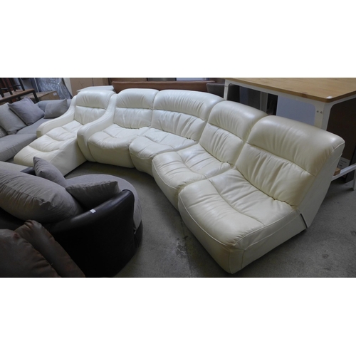 1639 - A cream leather sectional five piece sofa