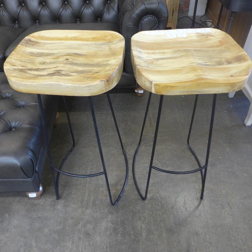 1671 - A Pair of mango wood and steel barstools *This lot is subject to VAT