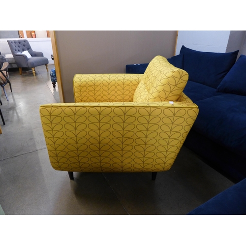 1358 - A turmeric patterned upholstered armchair