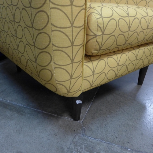 1358 - A turmeric patterned upholstered armchair