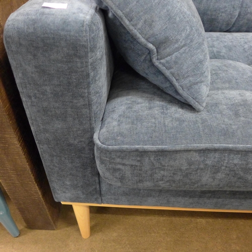 1380 - A Nero blue fabric three seater sofa on semi exposed timber frame