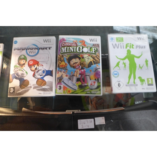 3167h - A Wii Fit Plus with balance board and 2 more games