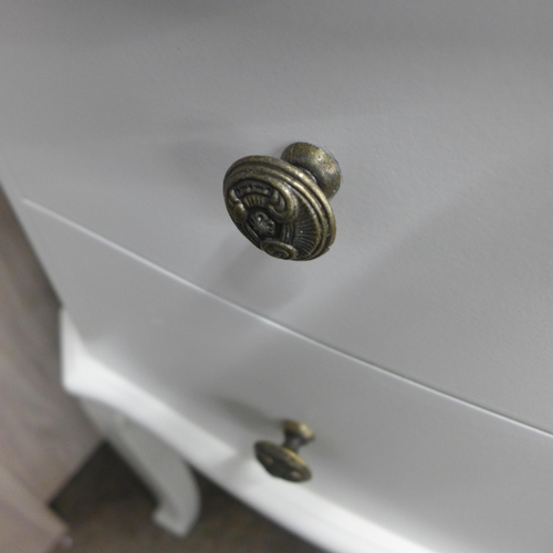 1402 - A two drawer white bedside chest