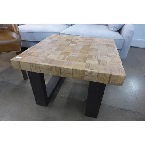 1352 - A teak coffee table with industrial style metal legs