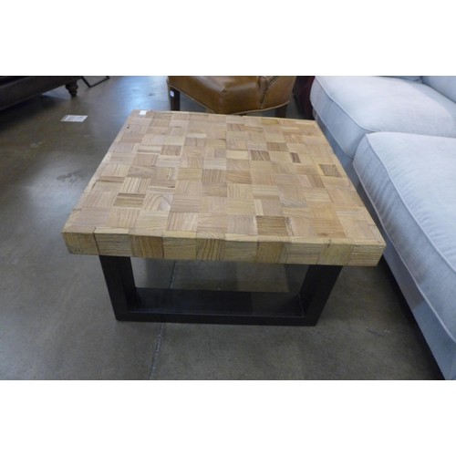 1352 - A teak coffee table with industrial style metal legs