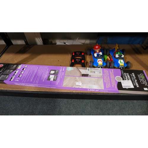 3176 - Rigid Core Vinyl Flooring and Mario Kart Twin Pack Rcemote control (247-38,58)  * This lot is subjec... 