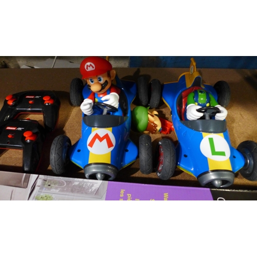 3176 - Rigid Core Vinyl Flooring and Mario Kart Twin Pack Rcemote control (247-38,58)  * This lot is subjec... 