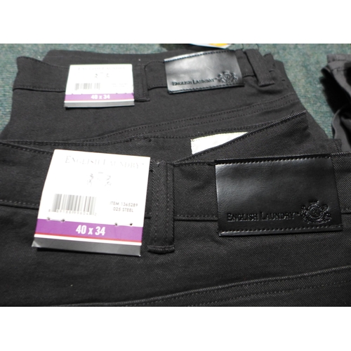 3203 - 4 Pairs of men's trousers, mixed sizes and styles * this lot is subject to VAT