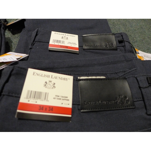 3204 - 10 Pairs of men's trousers, mixed sizes and styles * this lot is subject to VAT