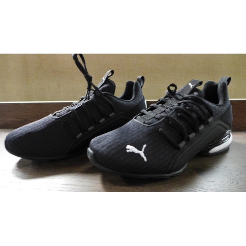 3411 - Pair of men's black & white soft foam - Puma trainers, UK size 7