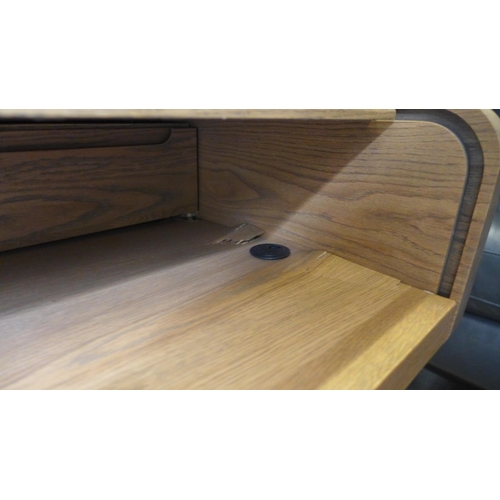 1649 - A Tambour oak roll top desk, damage to corner