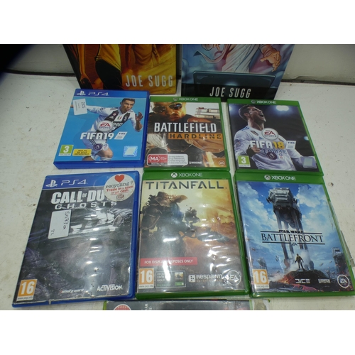 2325 - Approx 8 XBox One and PS4 games with 2 books