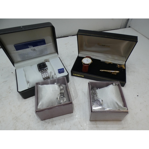 2334 - 4 Boxed wristwatches: 1 Geneva with cufflinks and tie pin; 2 Omaki lady's fashion/occasional watches... 