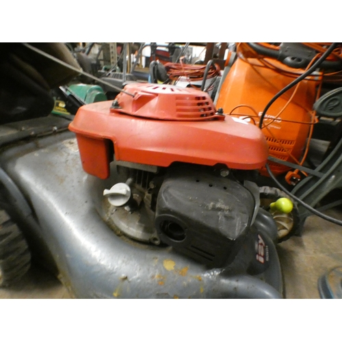 2462 - Honda 12Y 4.5HP petrol-driven lawnmower, Qualcast Panther 30DL push lawnmower, 2 spades & a garden f... 