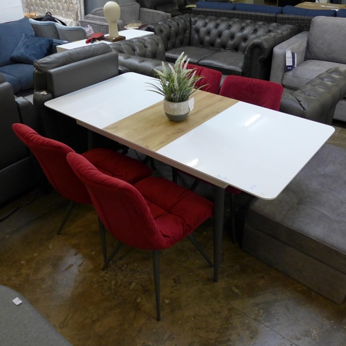 1534 - A Corran white gloss and oak extending dining table with a set of four Arana red velvet chairs