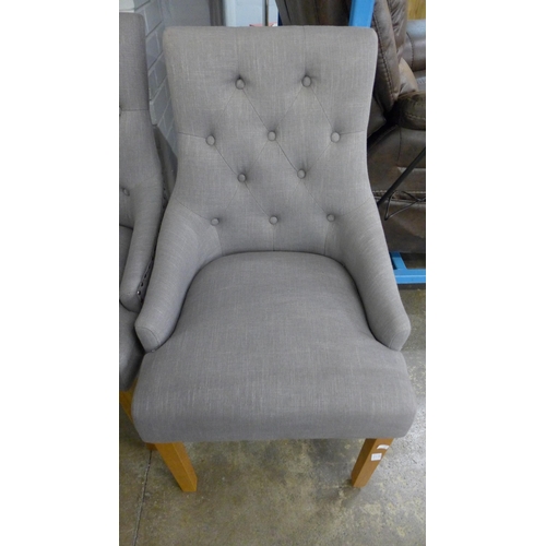 1572 - A pair of grey fabric studded side chairs