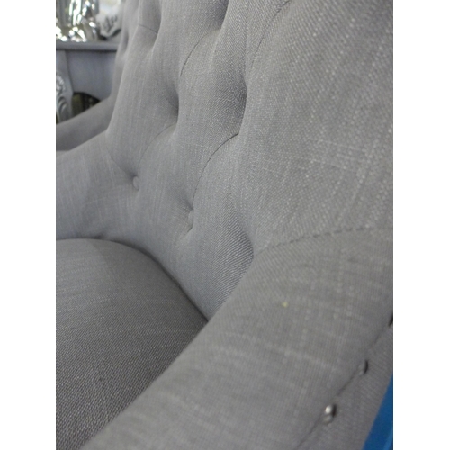 1572 - A pair of grey fabric studded side chairs