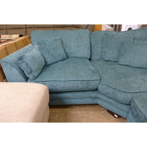 1581 - A teal upholstered corner sofa