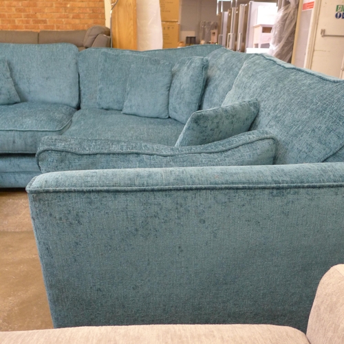 1581 - A teal upholstered corner sofa