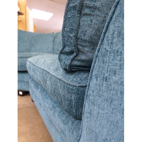 1581 - A teal upholstered corner sofa