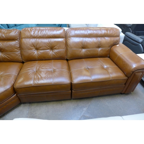 1583 - A tan leather corner sofa