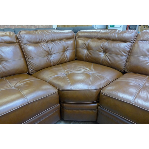 1583 - A tan leather corner sofa