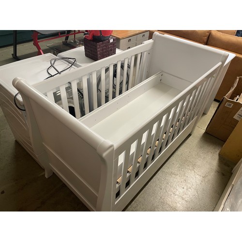 1737 - A white painted cot bed and chest of three drawers