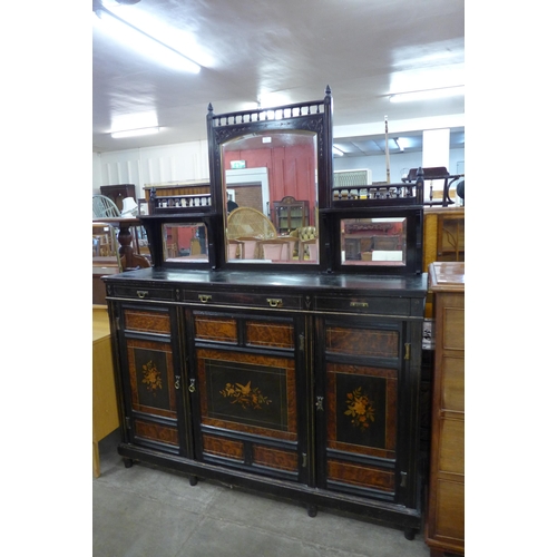 595 - A Victorian Aesthetic Movement ebonised, amboyna and marquetry inlaid mirrorback side cabinet