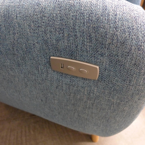 1999 - An Aegean blue textured weave armchair with electric footrest