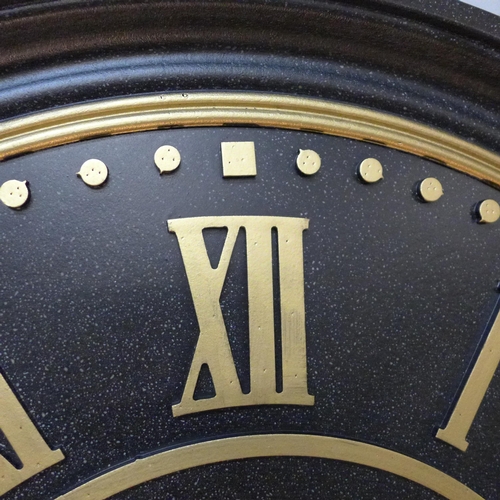 1450 - A large round embossed black and gold wall clock, H79cms (CL215238)   #