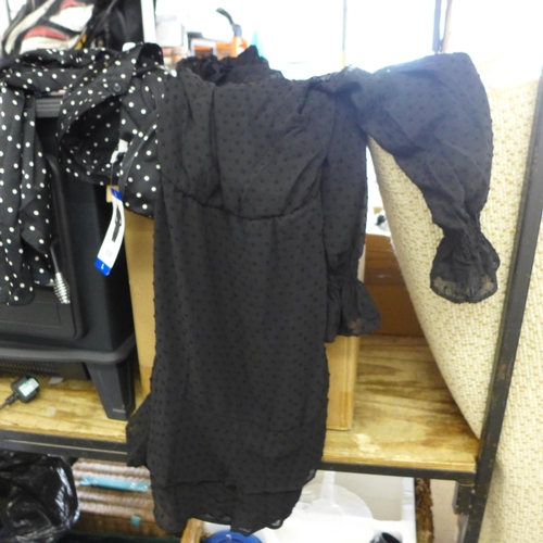 2057 - Large qty. of unused women's tops, blouses, etc. (approx 30 items)