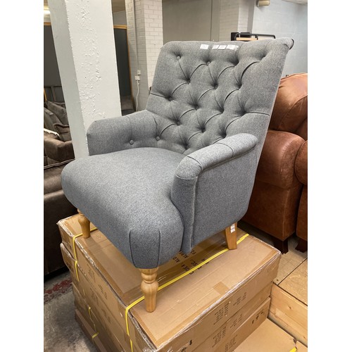 1356 - An Atlanta dark grey fabric button back armchair