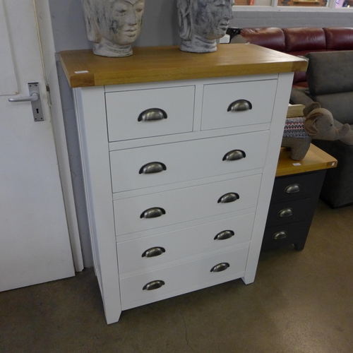 1313 - A Hampshire white painted and oak two over four chest of drawers *This Lot is Subject to VAT*