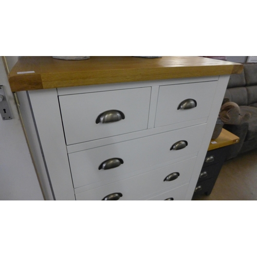 1313 - A Hampshire white painted and oak two over four chest of drawers *This Lot is Subject to VAT*