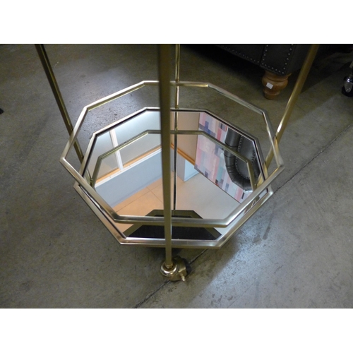 1354 - An octagonal metal and mirrored drinks trolley  *This lot is subject to VAT