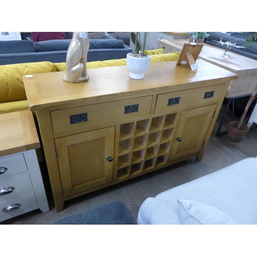 1463 - A Rutland oak large sideboard with wine rack *This Lot is Subject to VAT*