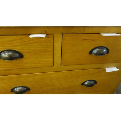 1467 - A Rutland oak two over three chest of drawers *This Lot is Subject to VAT*