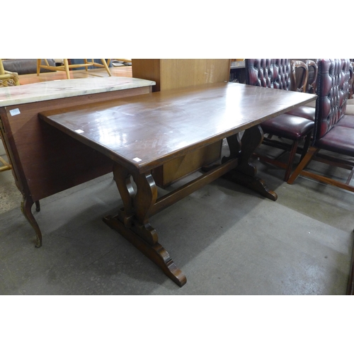 145 - An oak refectory table