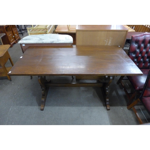 145 - An oak refectory table