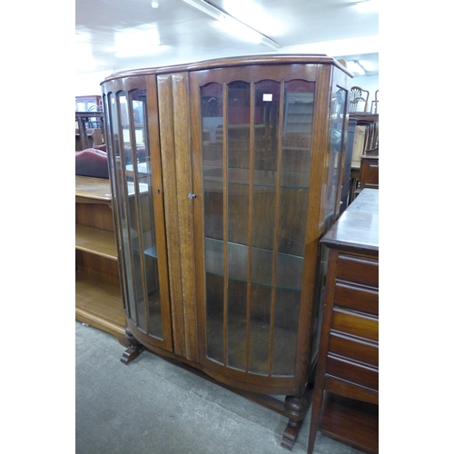 113 - An oak two door display cabinet